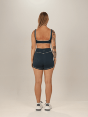 SHORT ESSENTIAL PETRÓLEO